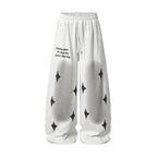 Spray Paint Star Print Distressed Sweatpants - Drenn