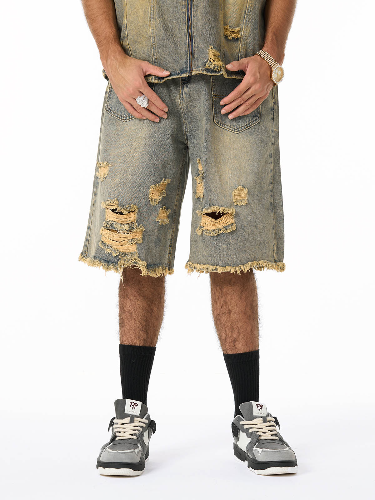 Conjunto de chaqueta y pantalón vaquero desgastado con roturas para hombre